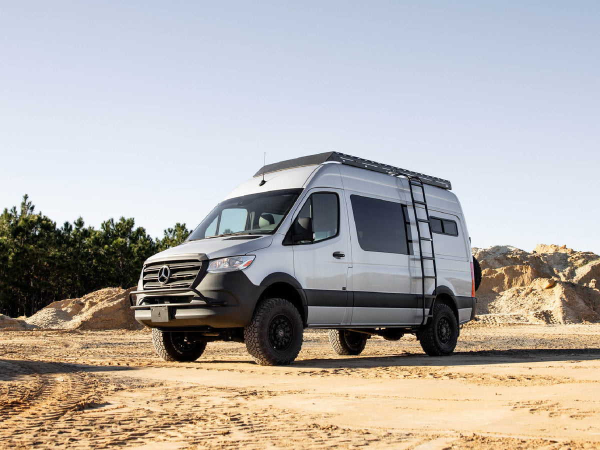 Sprinter camper van with Flatline nudge bar, Standard roof rack and Wheel Wrap side ladder