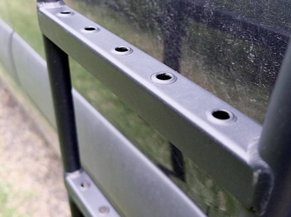 Dimpled traction steps on the Flatline Sprinter Side Ladder