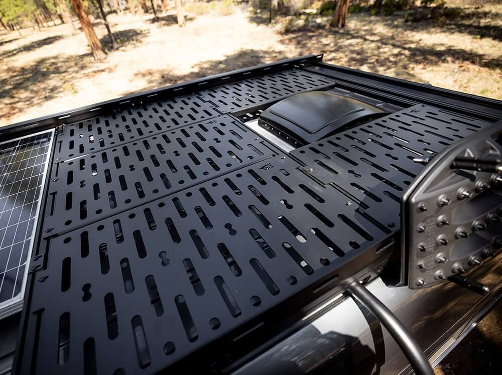 Decking panels with MaxTrax boards on a Sprinter Standard roof rack