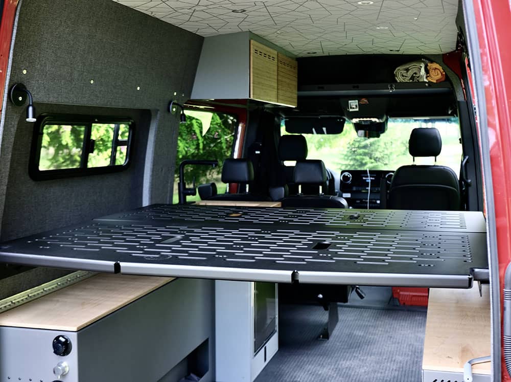 Flatline van bed system in a Sprinter with Flarespace
