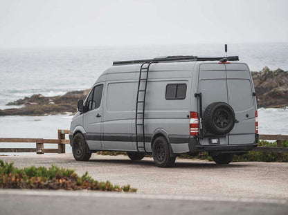 Sprinter 170" camper van with Flatline Side Ladder at the beach