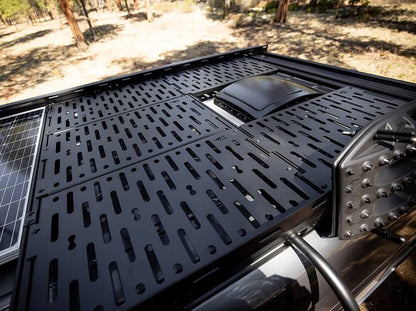 Decking panels with MaxTrax boards on a Sprinter Standard roof rack